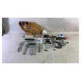 Assortment of baseball equipment and tools