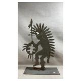 metal silhouette sculpture depicting a Native