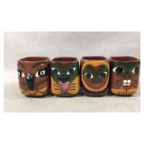 Four Handcrafted Ceramic Face Mugs