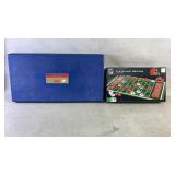 Two board games monopoly and football checkers