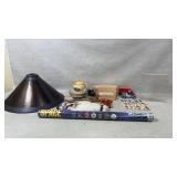 Lamp shade, kachina postcards, toy train tracks