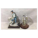 Sculpture and figurine with pocket watch