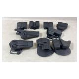 Black Holsters and Magazine Pouches