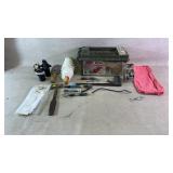 A ammo/tool crate with an assortment of tools