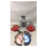 Vase and wall art faces
