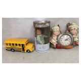 Campbells kid, clock, and school bus