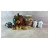 Assortment of kitchen dishes: measuring cups,