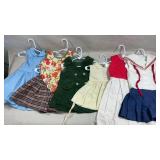 collection of vintage-style dresses and outfits