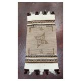 vintage, hand-woven wool accent rug featuring a
