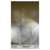 set of pre-lit artificial white birch trees,