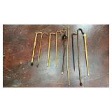 Collection of 9 wooden canes