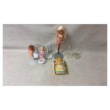 Dolls and lots of doll stands vintage-style