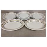 8 Dinner plates/2 platters, marking