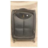 Travelpro Black Rolling Suitcase With Gold Logo