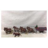 Antique cast iron horse drawn beer wagon