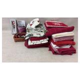 Towels, electric wine opener and festive wine