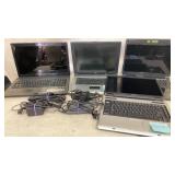 4 laptops, untested, cords