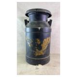 Antique dairy milk jug with eagle art
