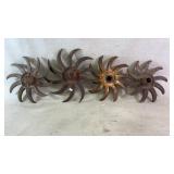(4) vintage cast iron rotary hoe wheels