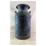 Antique black milk jug