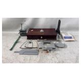 Antique wooden drawer with miscellaneous items