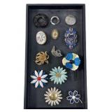 Assortment of antique & Vintage designer brooches