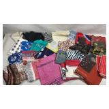 collection of assorted silk scarves featuring