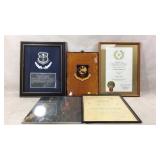 Framed awards and wall art