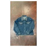 blue denim jacket from the brand Christine