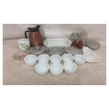 various pieces of vintage milk glass, including