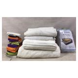 Wash cloths and towels and blanket bags