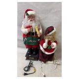 Vintage animated Santa Claus and girl figures