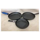 Three Cast Iron Skillets with Handle Cover