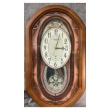 Rhythm Small World Musical Motion Wall Clock