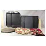 Baking pans, oven mits, table mats