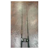 Daiwa RS1100 baitcasting reel attached to a
