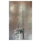 vintage Shakespeare EX35 fishing reel attached