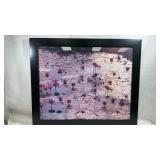 framed artwork is a print titled "Lotus Pond" by