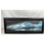 framed artwork is a landscape print titled