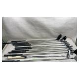 Collection of golf clubs including pro tech,