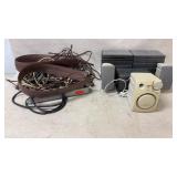 DVD cases, extension chords and Roland MA-12C