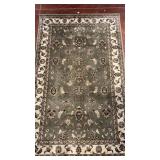 Green and Cream Colored Small Area Rug