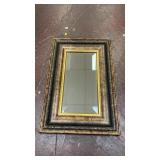 decorative rectangular wall mirror featuring an