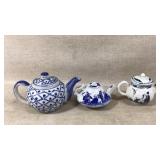 Three Blue and White Ceramic Teapots