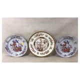 Three Decorative Plates with Floral Designs