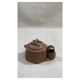 A YIXING TEAPOT AND COVER IN THE FORM OF A WELL
