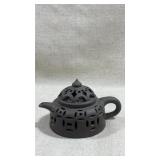 vintage Yixing Zisha teapot featuring a dark c