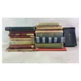 Assortment of vintage books and Bible