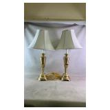A pair of brass table lamps