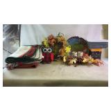 Assortment of fall decorations and laundry basket